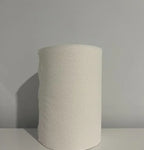 Single white paper towel roll with textured surface on a plain background