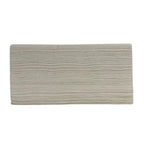 Stack of beige paper cleaning towels with textured lines, ideal for household cleaning