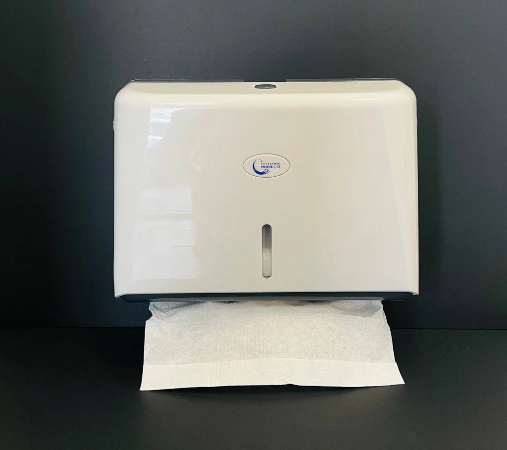 Wall-mounted white paper towel dispenser for commercial washrooms on a black background